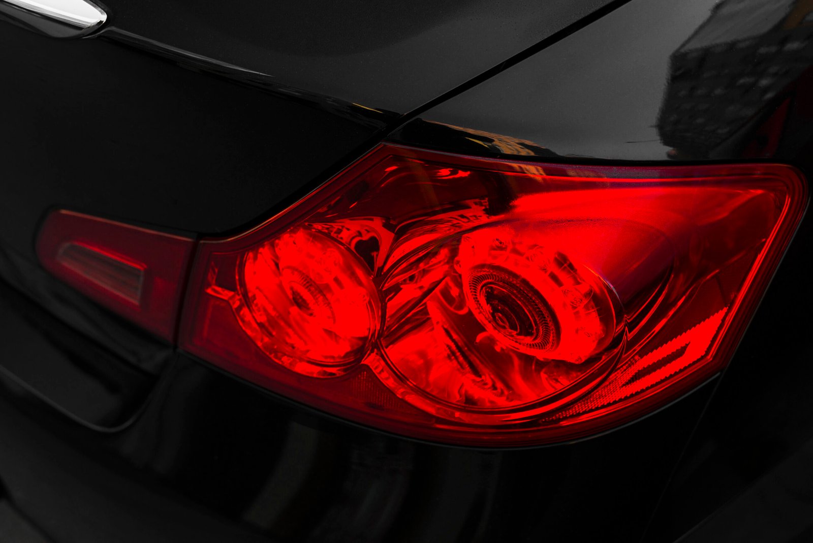 back-black-car-with-red-rear-light